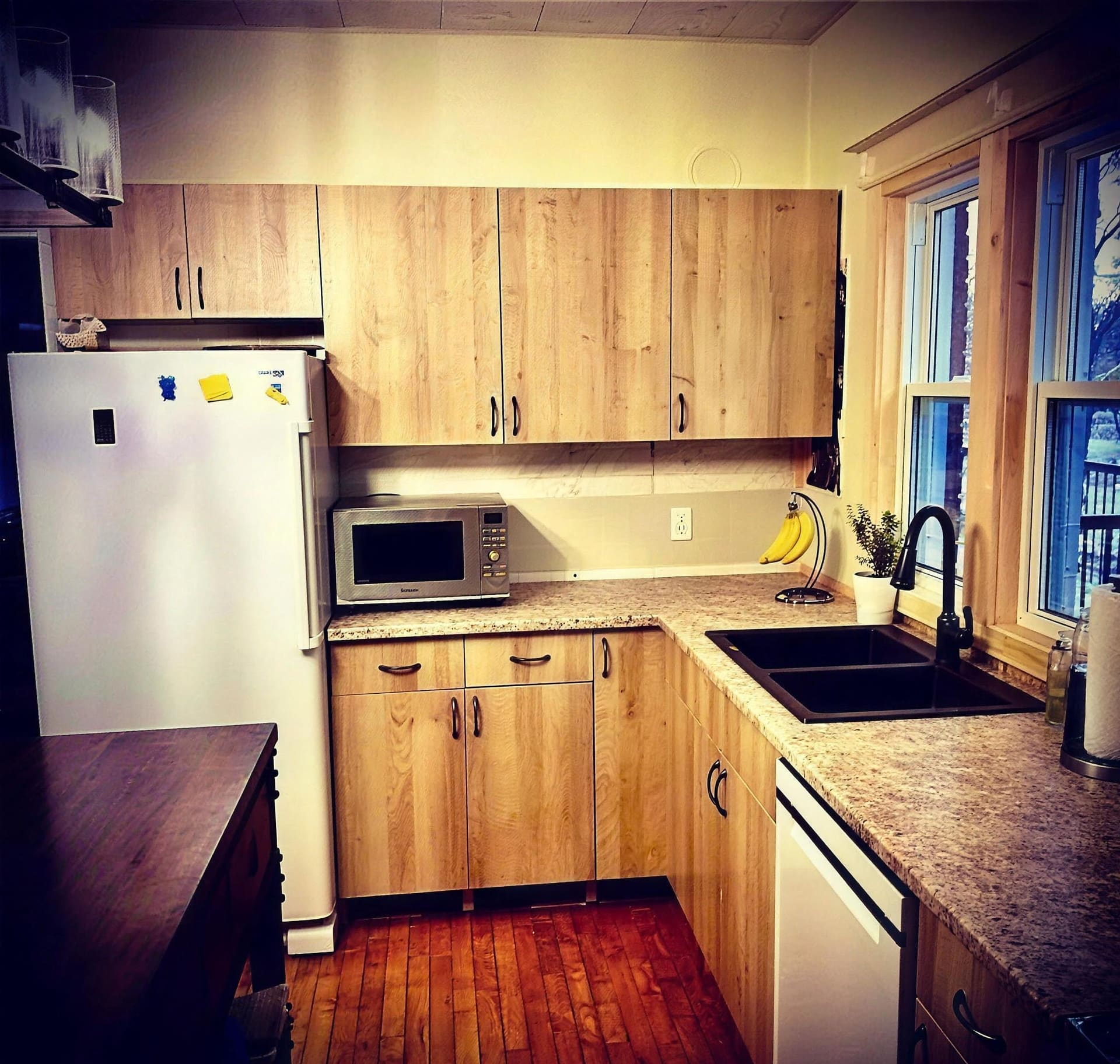 A kitchen transformed with new cabinets, a new sink and a new home for the dishwasher, by The Laughing Heart Plumbing Company